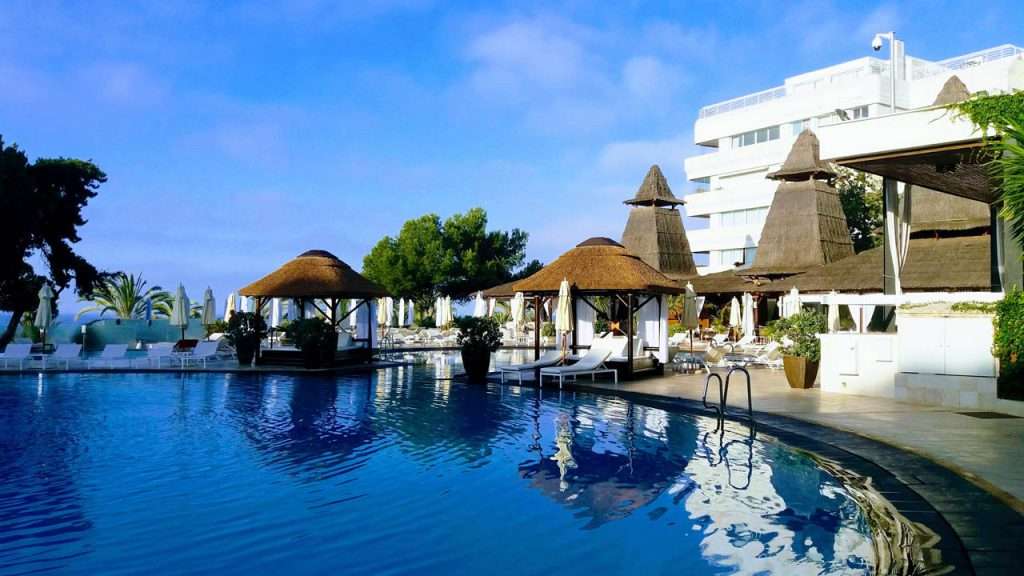 Gran Melia Don Pepe thatched poolside daybeds cabanas