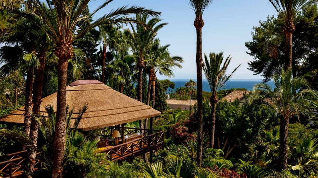 Sustainable shading thatched gazebo with timber decking and balustrades