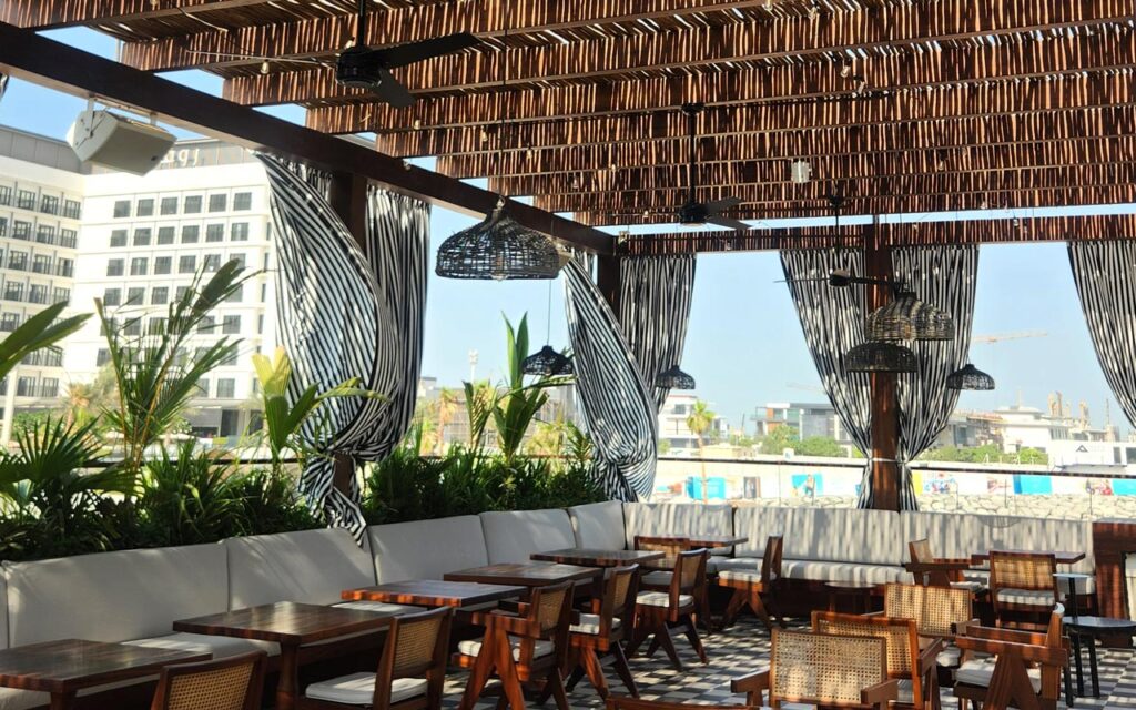 Custom-built timber pergolas and luxury outdoor living spaces at Gitano Dubai